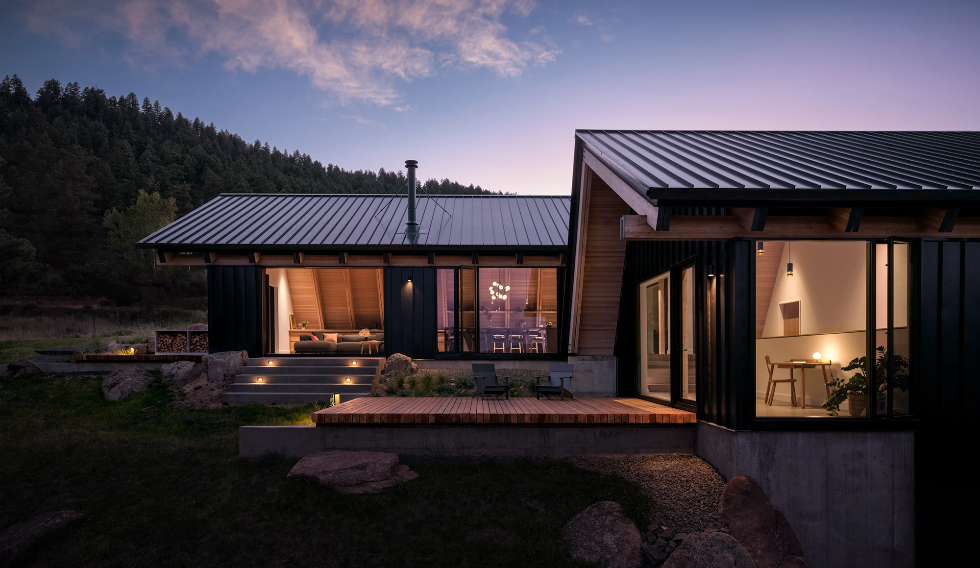 The sun setting over a landscape design in Colorado by Green Landscape Design.